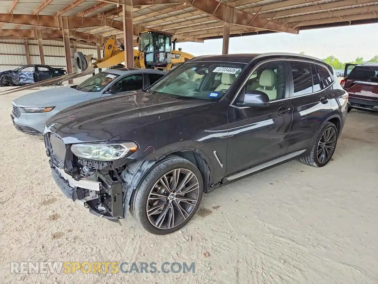 1 Photograph of a damaged car 5UX43DP04R9V11059 BMW X3 2024