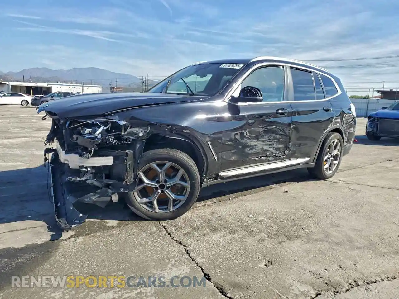 1 Photograph of a damaged car 5UX43DP04R9W43352 BMW X3 2024