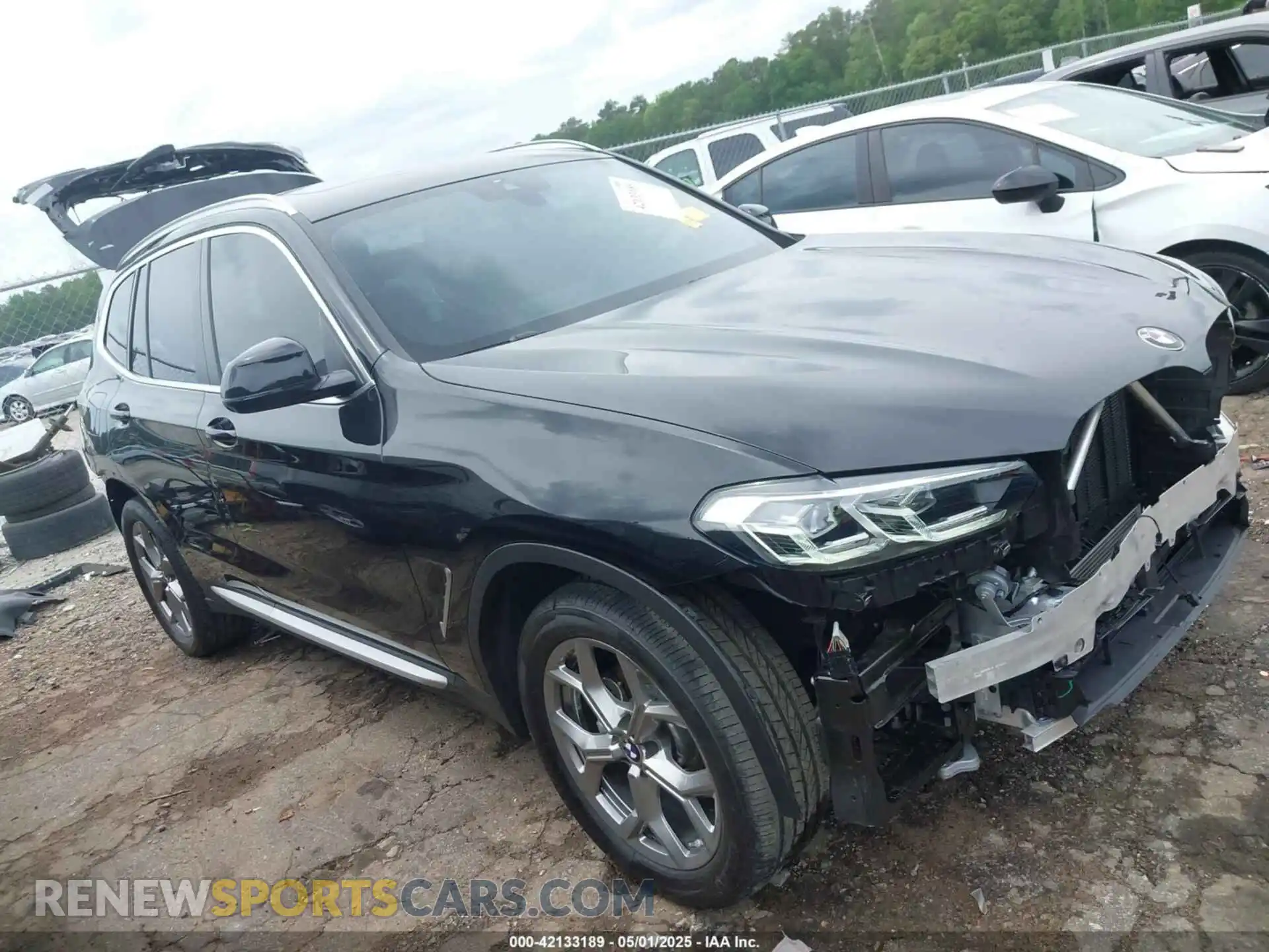 1 Photograph of a damaged car 5UX43DP05R9V19705 BMW X3 2024