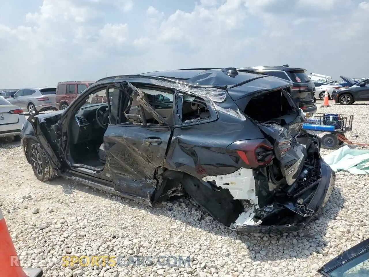 2 Photograph of a damaged car 5UX43DP06R9V09149 BMW X3 2024