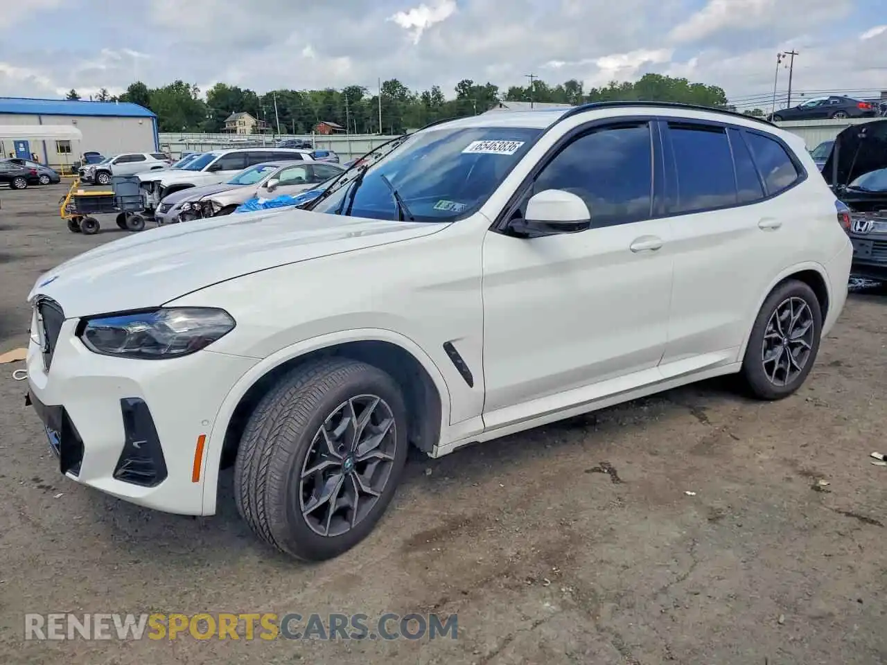 1 Photograph of a damaged car 5UX53DP00R9U01050 BMW X3 2024