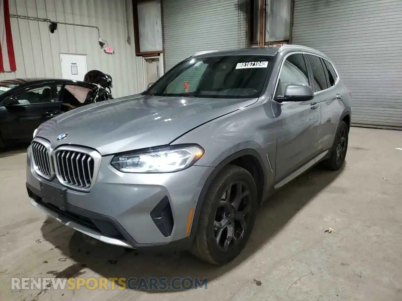 1 Photograph of a damaged car 5UX53DP02R9U23230 BMW X3 2024
