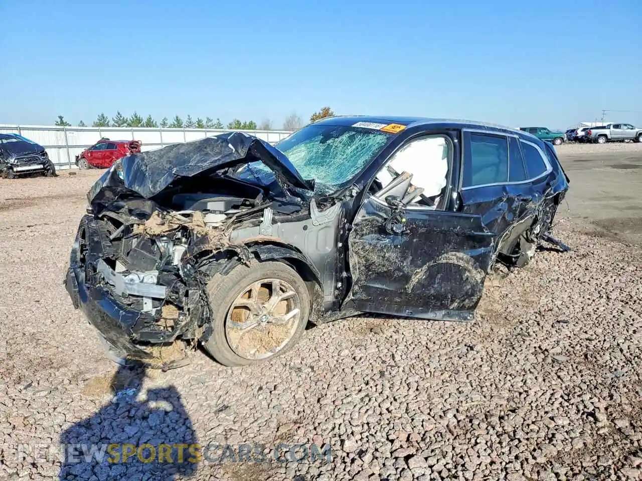 1 Photograph of a damaged car 5UX53DP03R9U63039 BMW X3 2024