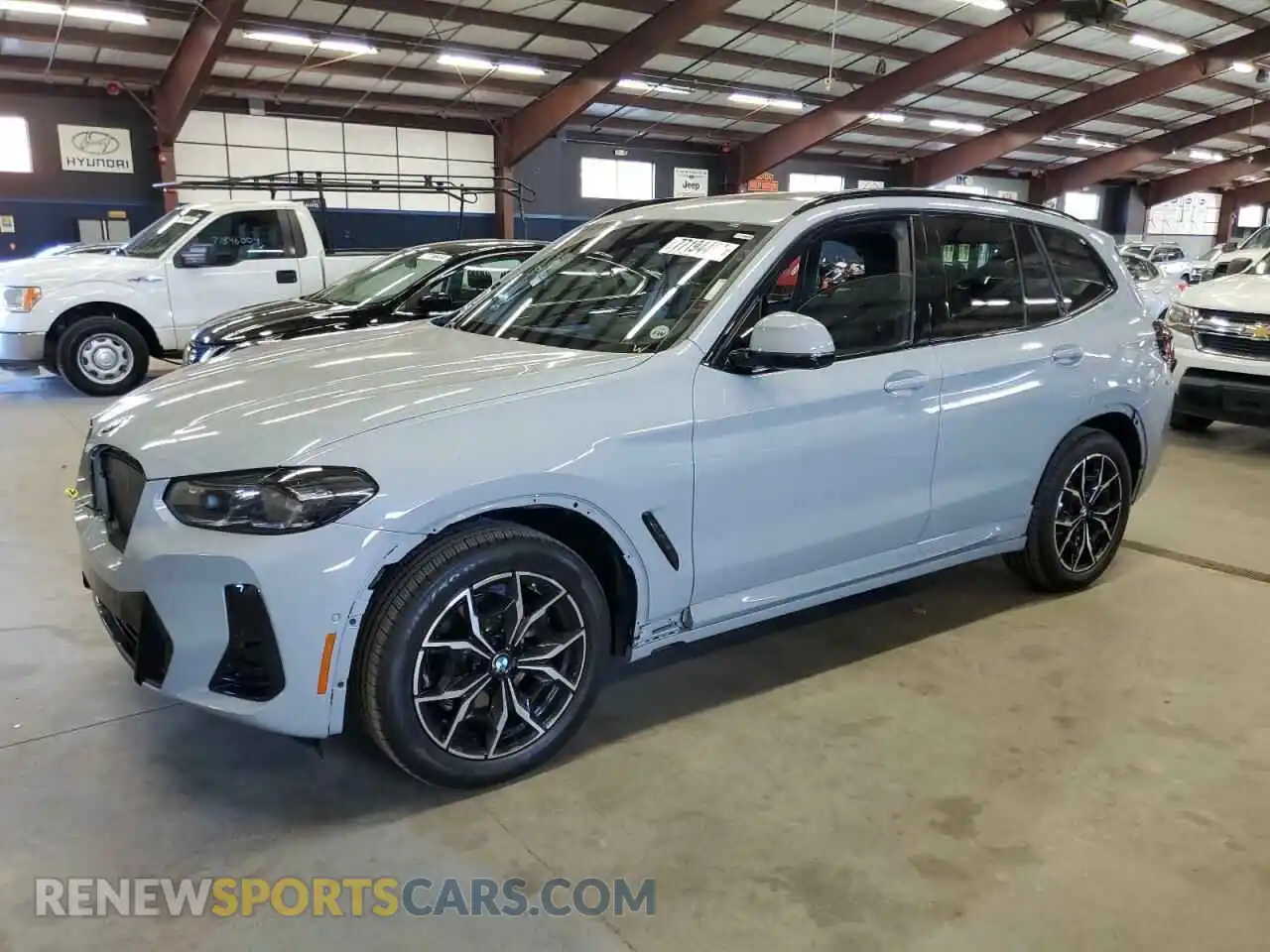 1 Photograph of a damaged car 5UX53DP07R9X26620 BMW X3 2024