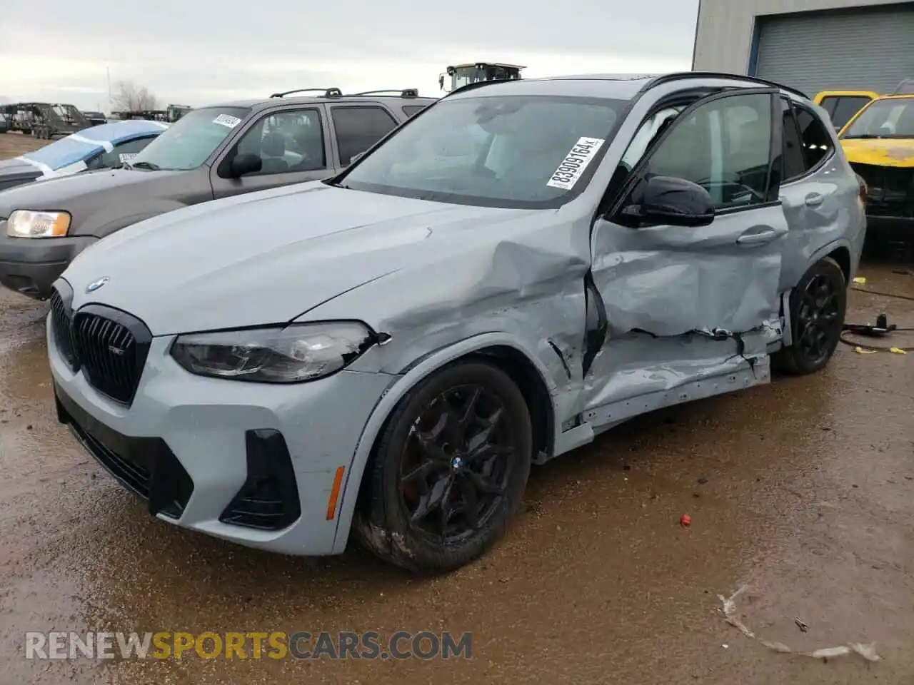 1 Photograph of a damaged car 5UX83DP02P9P63794 BMW X3 M40I 2023