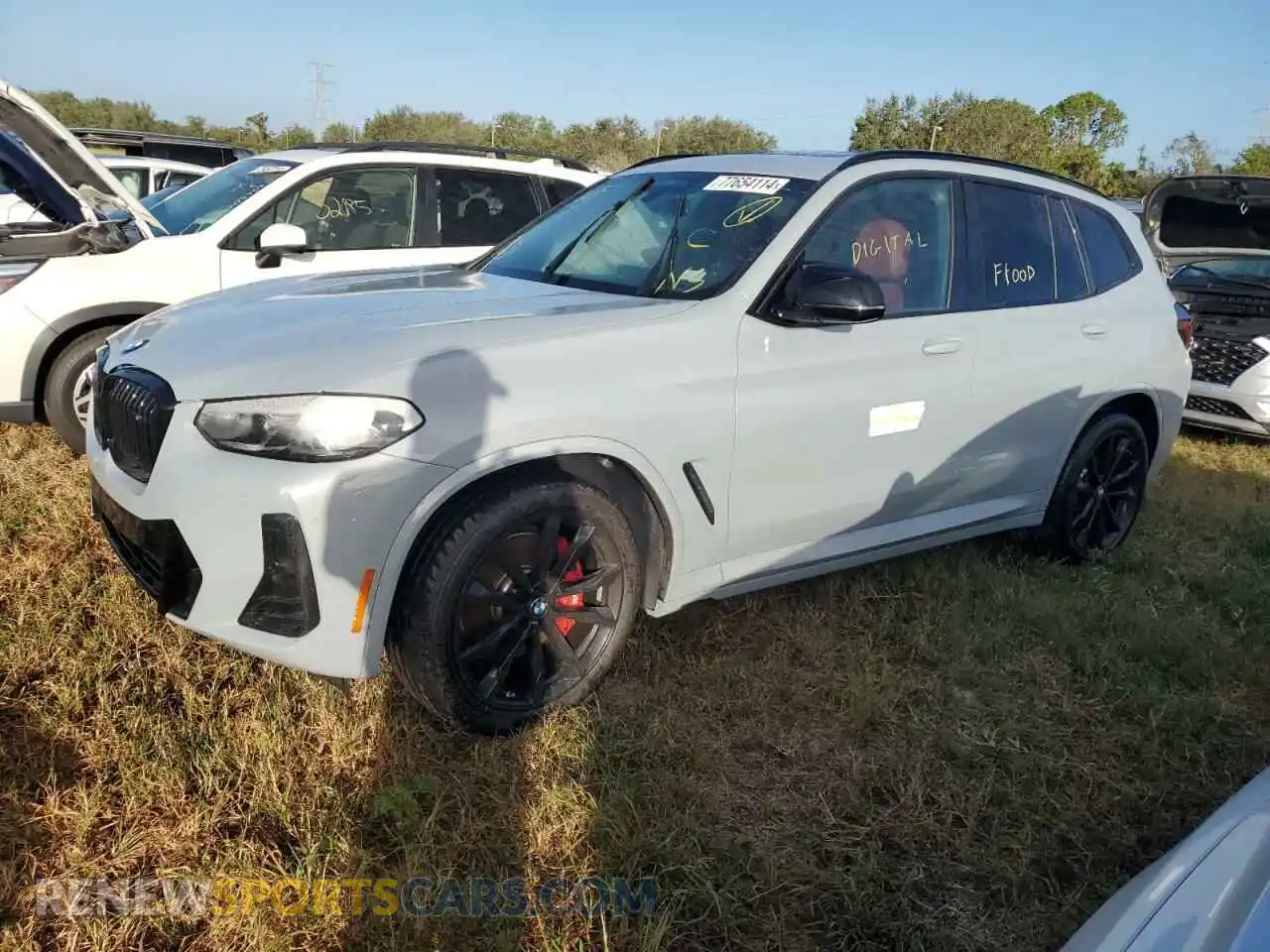 1 Photograph of a damaged car 5UX83DP04P9P70939 BMW X3 M40I 2023