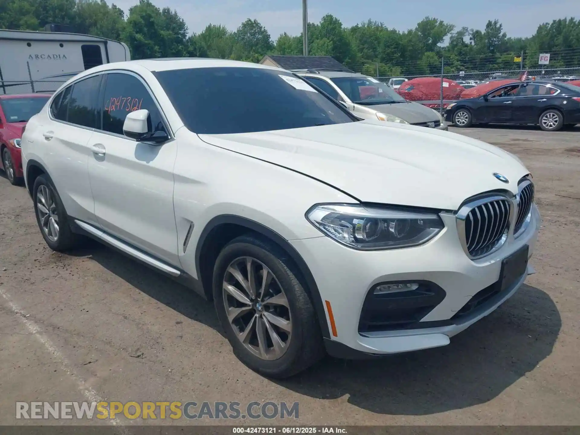 1 Photograph of a damaged car 5UXUJ3C56KLG57413 BMW X4 2019