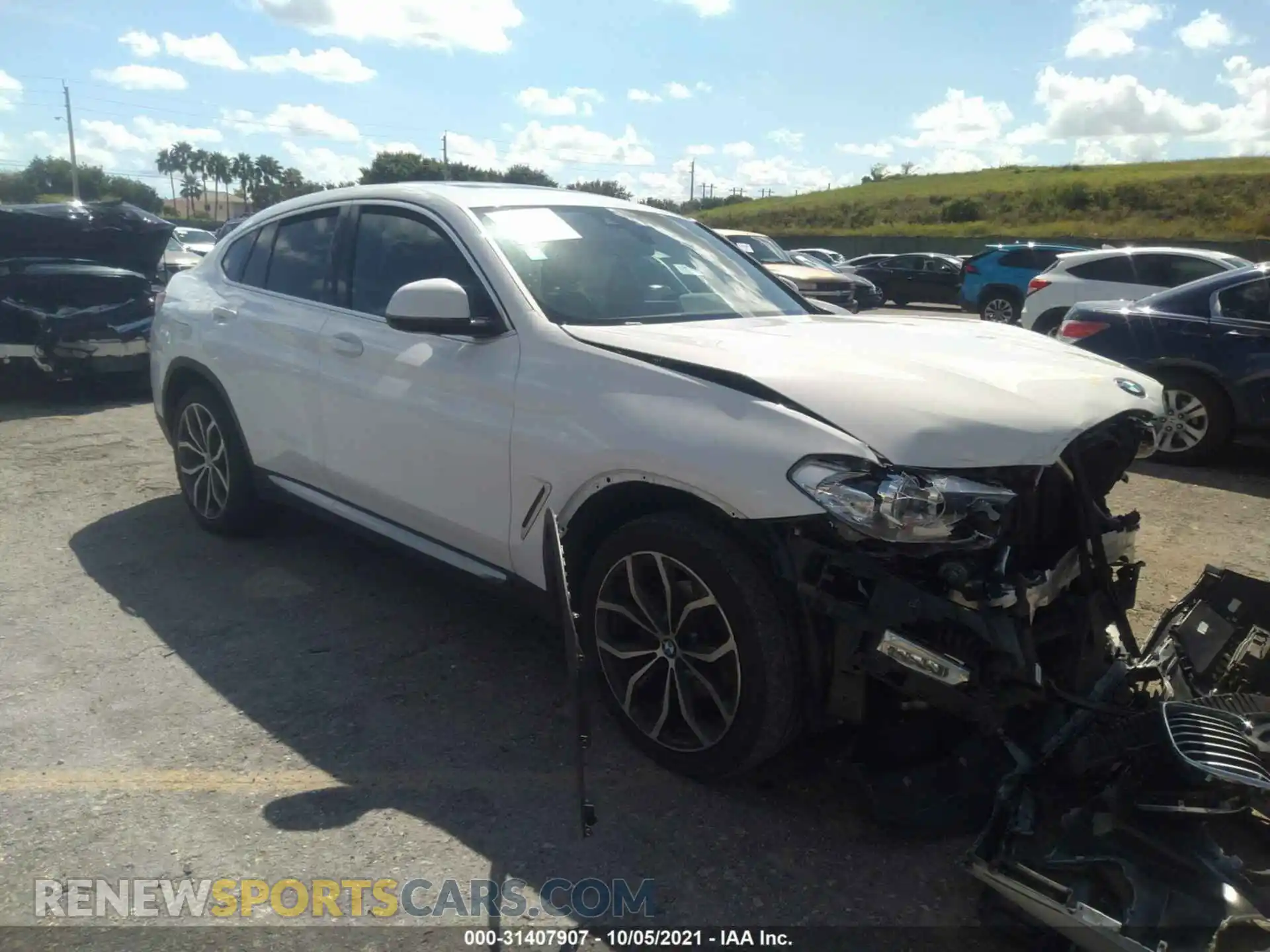 1 Photograph of a damaged car 5UXUJ3C5XKLG56748 BMW X4 2019