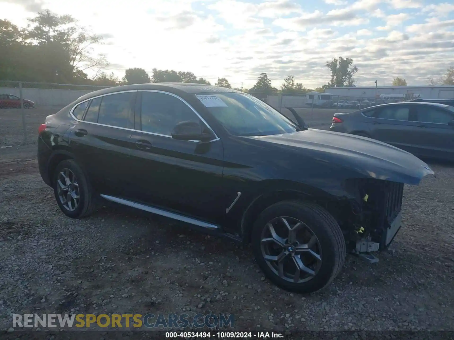 1 Photograph of a damaged car 5UX2V1C09L9C59213 BMW X4 2020