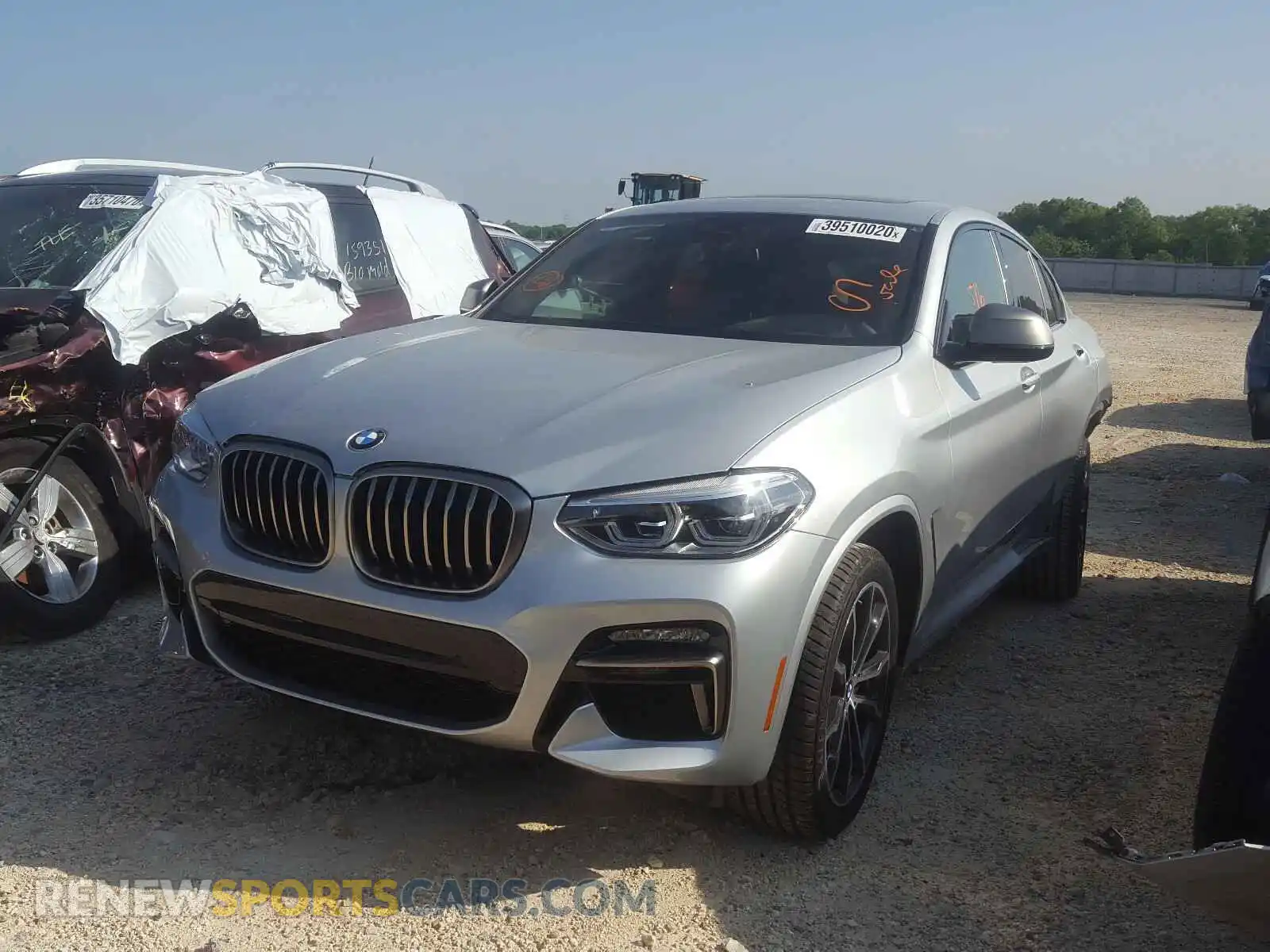 2 fotografías del automóvil dañado 5UX2V5C07LLE69688 BMW X4 2020