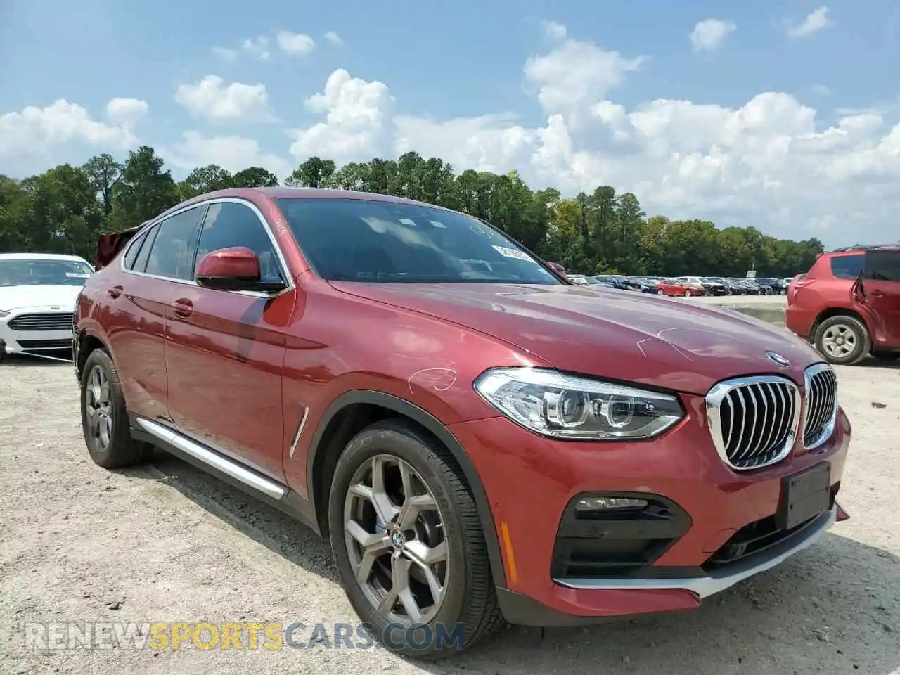 1 Photograph of a damaged car 5UX2V1C02M9E37156 BMW X4 2021