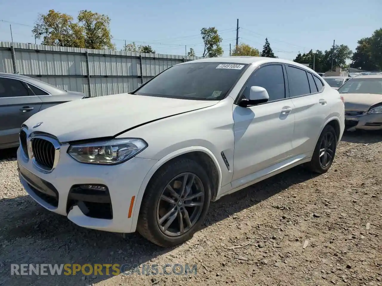 1 Photograph of a damaged car 5UX2V1C04M9H89087 BMW X4 2021