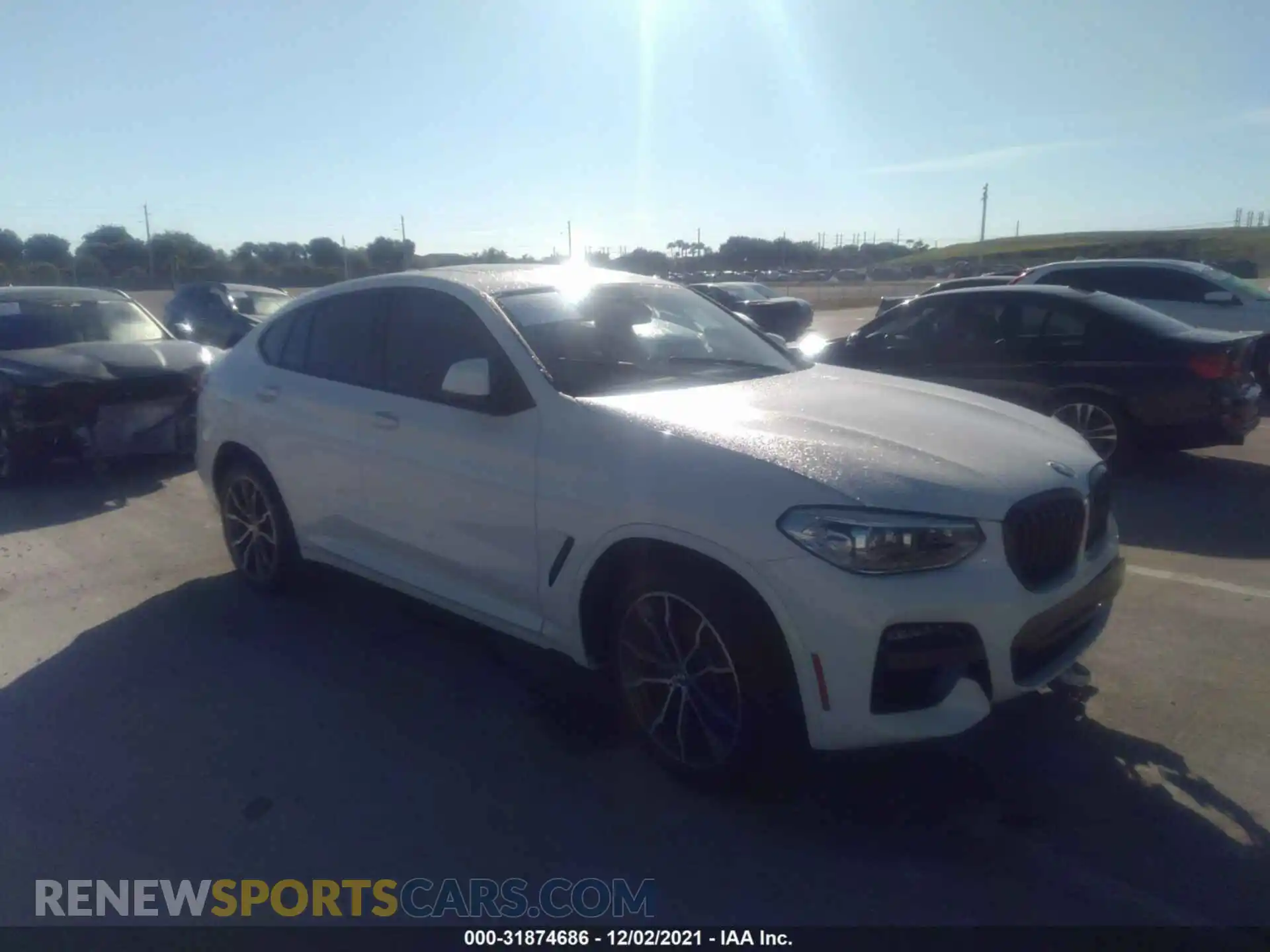 1 Photograph of a damaged car 5UX2V1C05M9H34129 BMW X4 2021