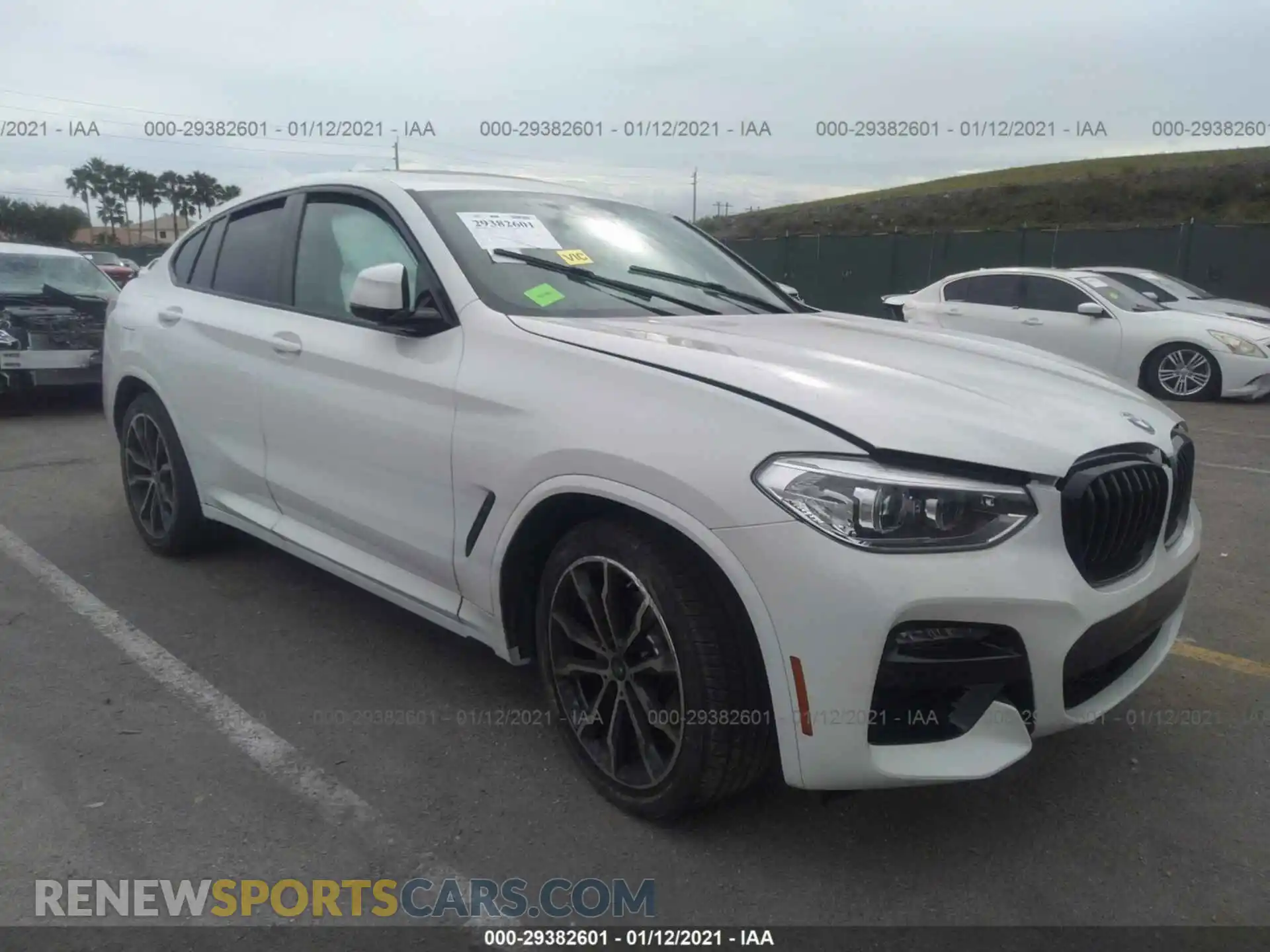 1 Photograph of a damaged car 5UX2V1C07M9E11099 BMW X4 2021