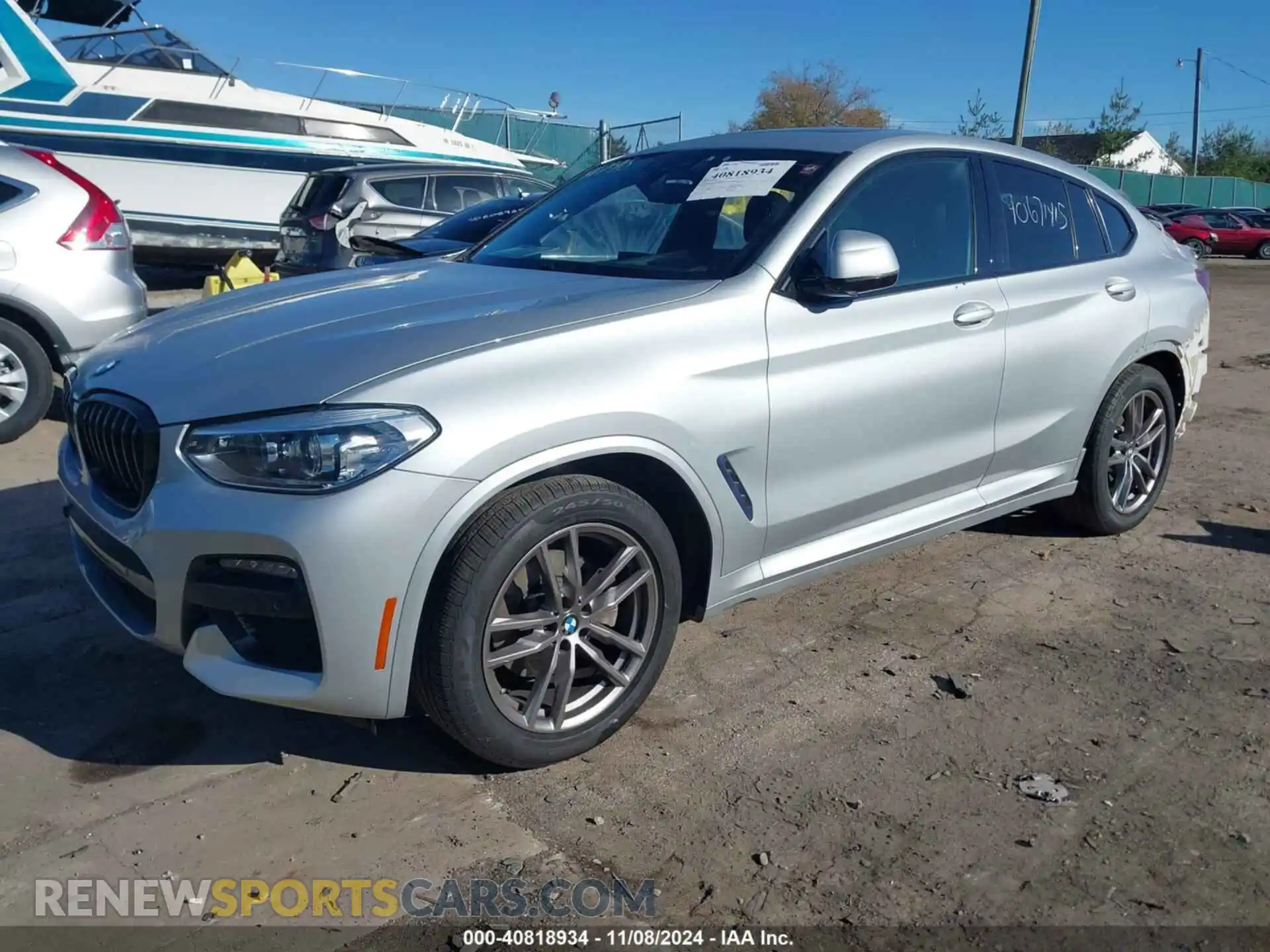 2 Photograph of a damaged car 5UX2V1C07M9F36930 BMW X4 2021