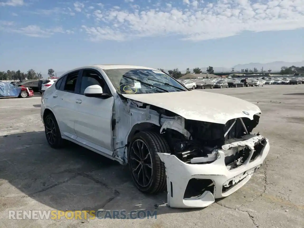 1 Photograph of a damaged car 5UX2V1C09M9G79216 BMW X4 2021