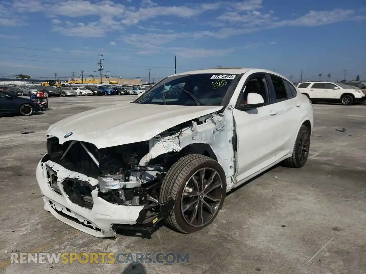 2 Photograph of a damaged car 5UX2V1C09M9G79216 BMW X4 2021