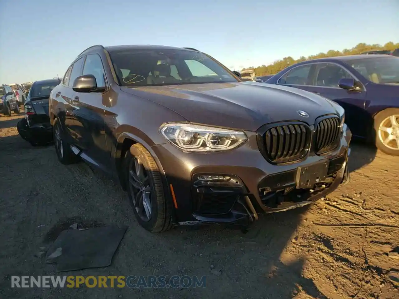 1 Photograph of a damaged car 5UX2V5C05M9H38379 BMW X4 2021