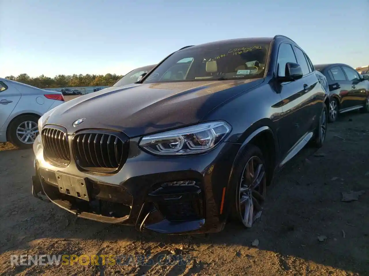 2 Photograph of a damaged car 5UX2V5C05M9H38379 BMW X4 2021