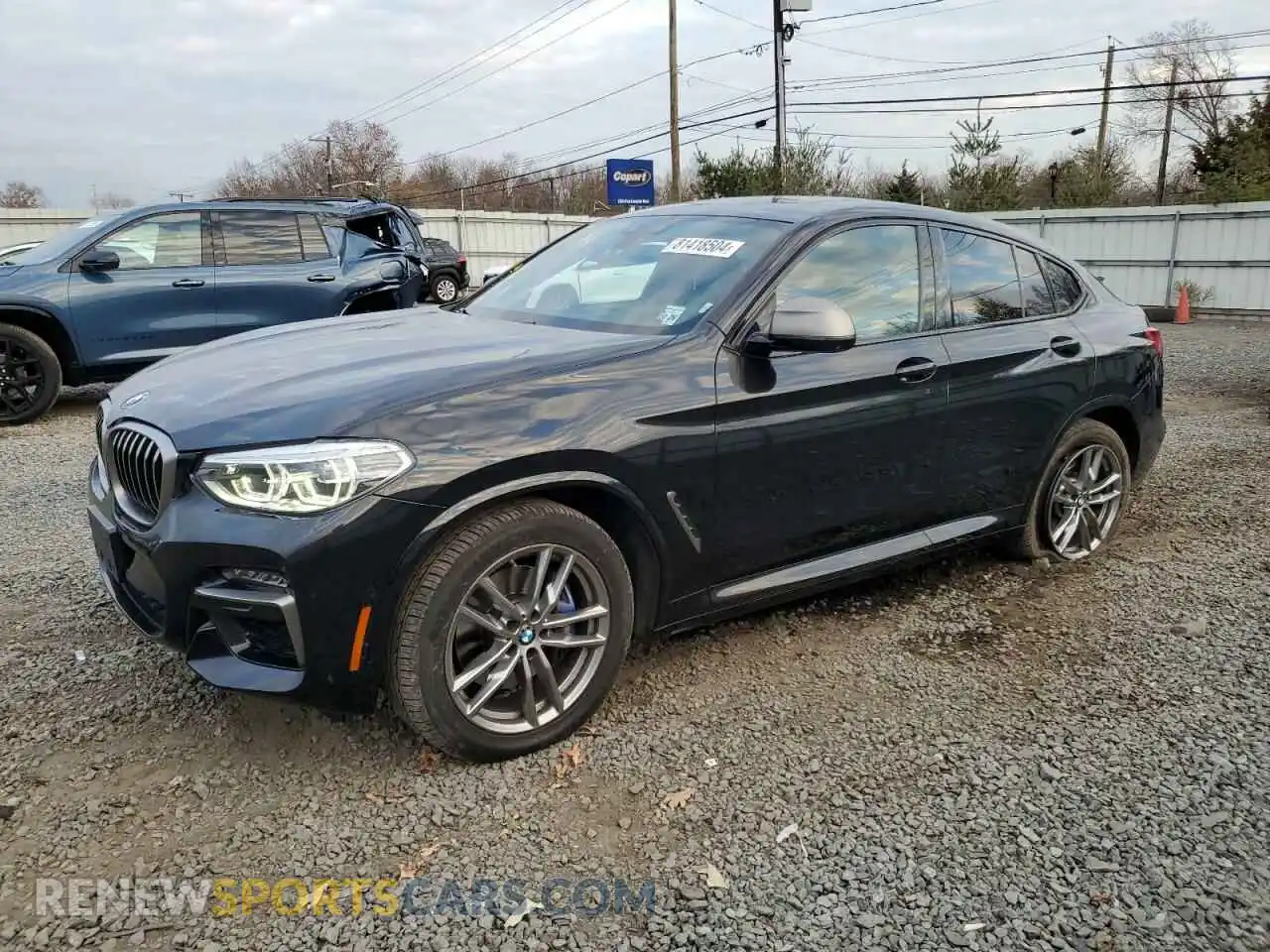 1 Photograph of a damaged car 5UX2V5C06M9E29536 BMW X4 2021