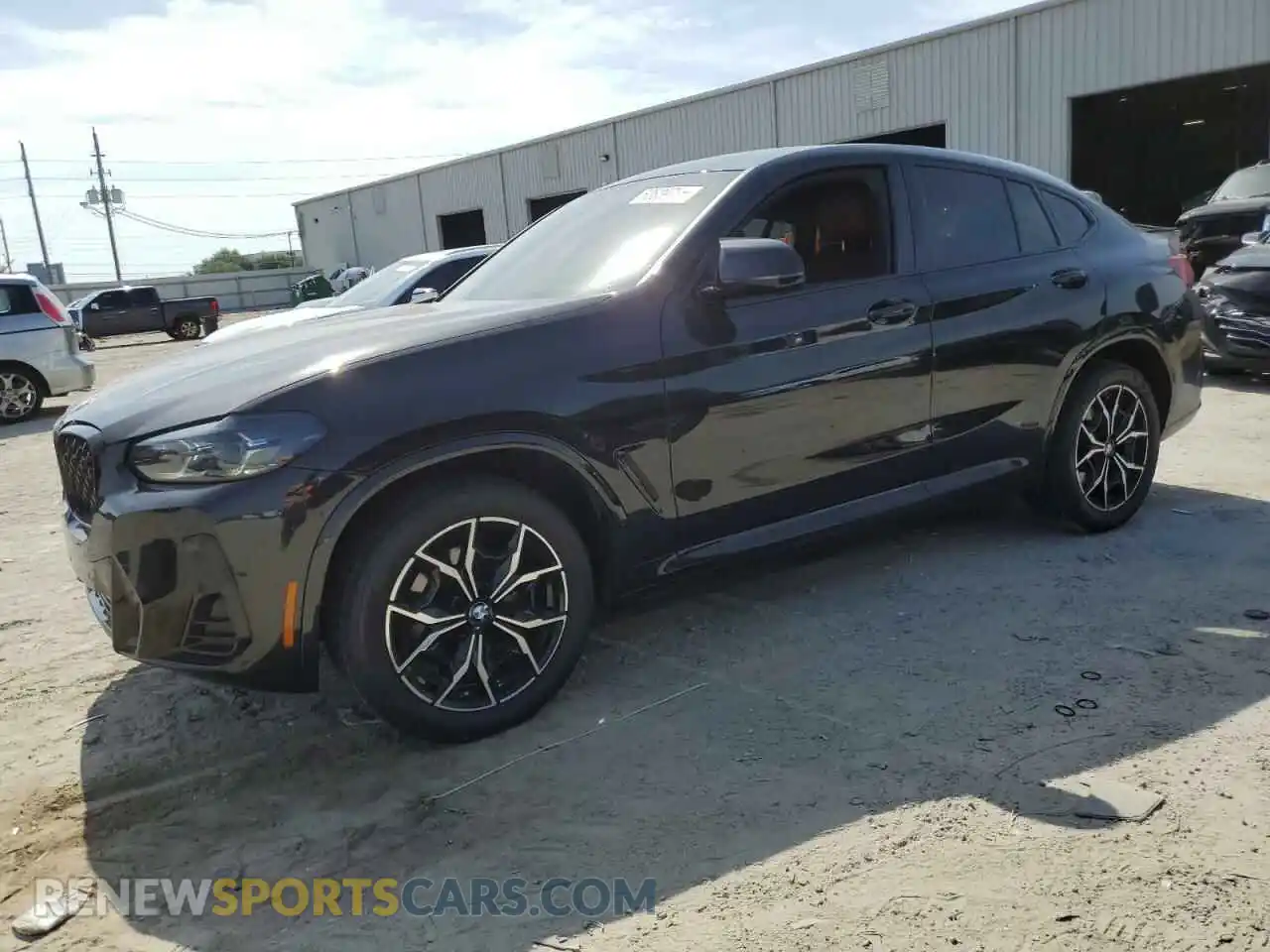 1 Photograph of a damaged car 5UX33DT01P9N72142 BMW X4 2023