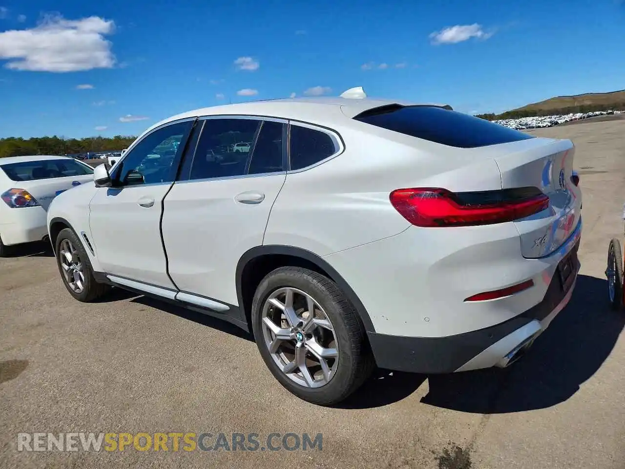 2 fotografías del automóvil dañado 5UX33DT01P9P68419 BMW X4 2023