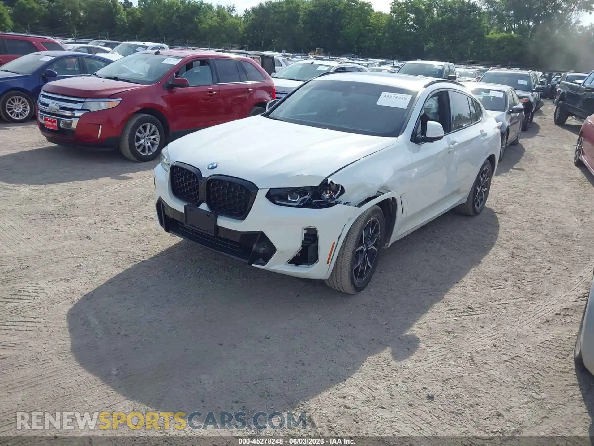2 fotografías del automóvil dañado 5UX33DT01P9R66241 BMW X4 2023