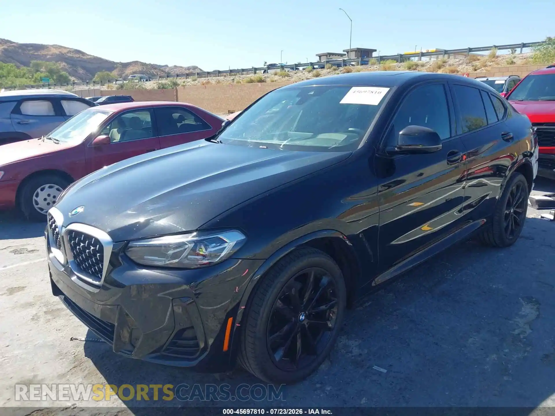 2 fotografías del automóvil dañado 5UX33DT03P9N53513 BMW X4 2023