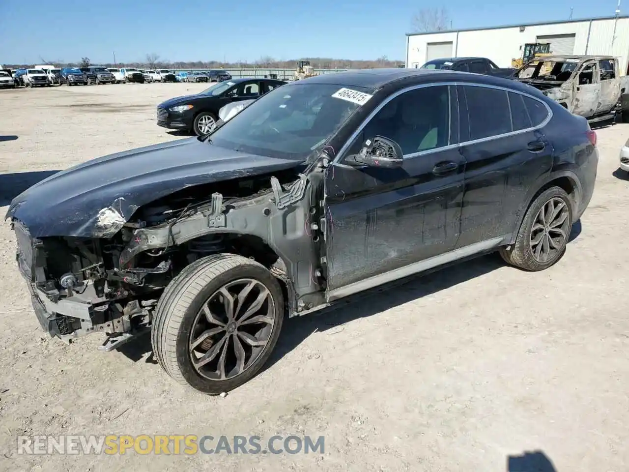 1 Photograph of a damaged car 5UX33DT03P9P53369 BMW X4 2023