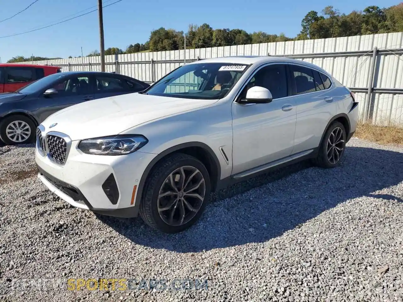 1 Photograph of a damaged car 5UX33DT05P9P82582 BMW X4 2023