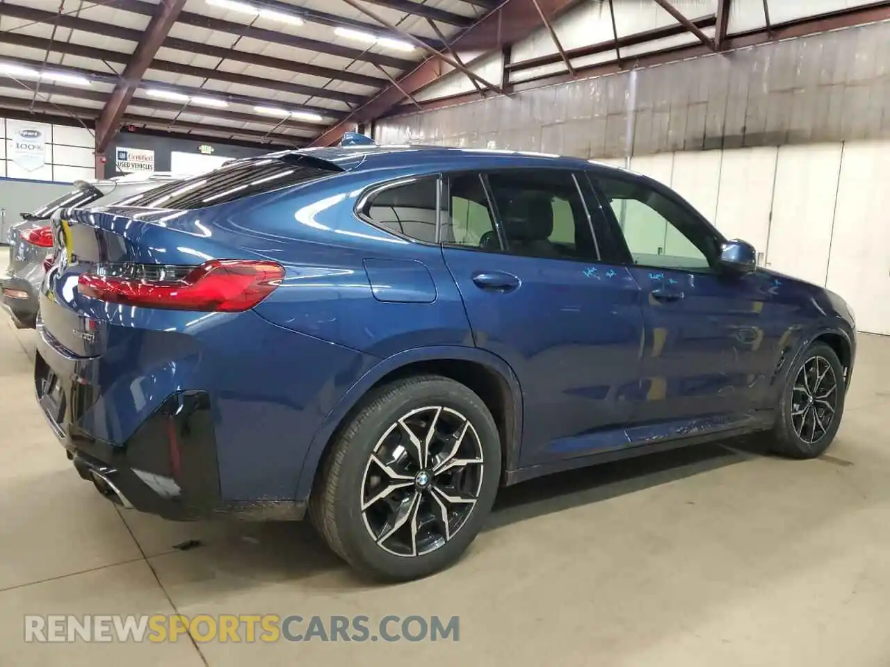 3 Photograph of a damaged car 5UX33DT08P9P12848 BMW X4 2023
