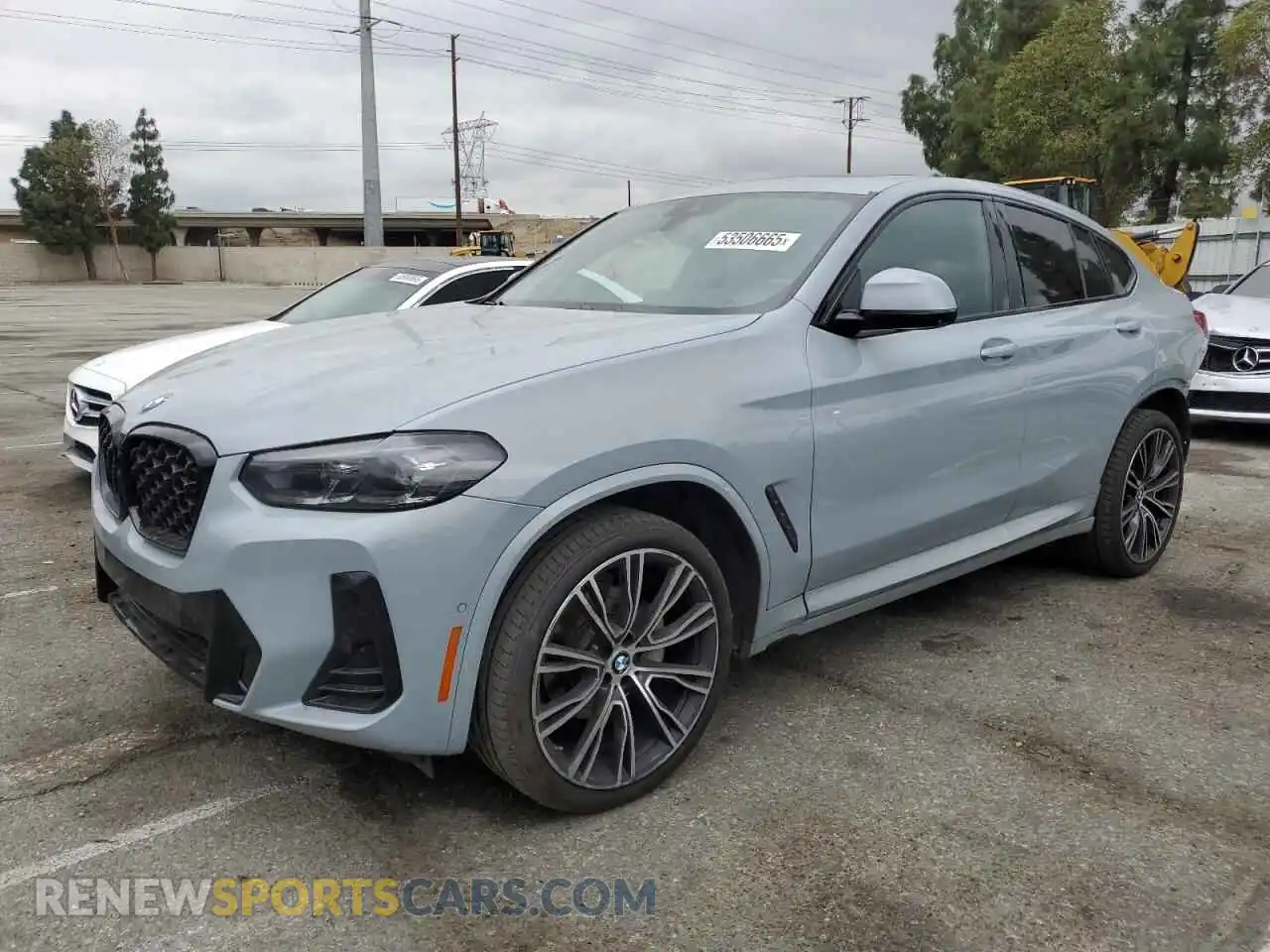 1 Photograph of a damaged car 5UX33DT0XP9P06419 BMW X4 2023