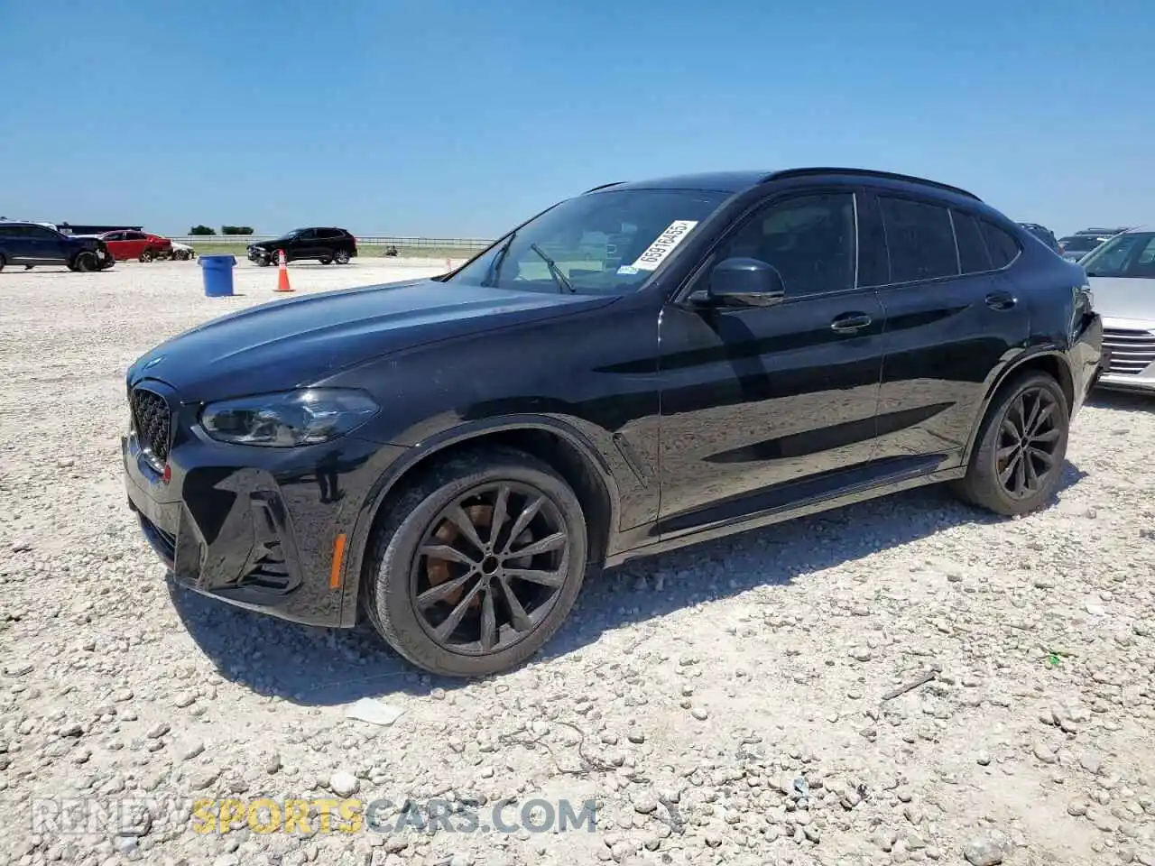 1 Photograph of a damaged car 5UX33DT0XP9T13357 BMW X4 2023