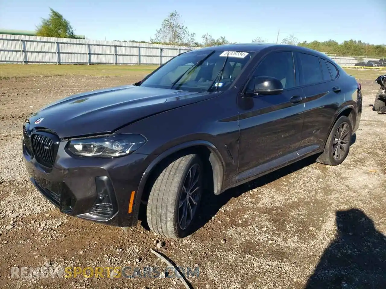 1 Photograph of a damaged car 5UX43DT01P9N51344 BMW X4 2023