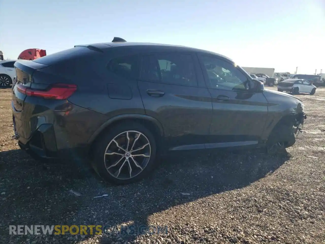 3 Photograph of a damaged car 5UX43DT01P9N51344 BMW X4 2023