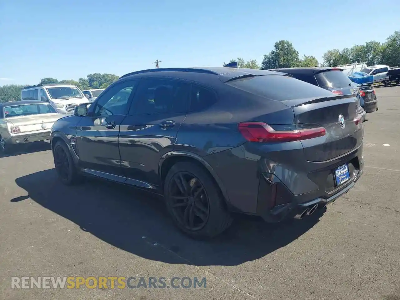 2 fotografías del automóvil dañado 5YM23EC02P9T18059 BMW X4 2023