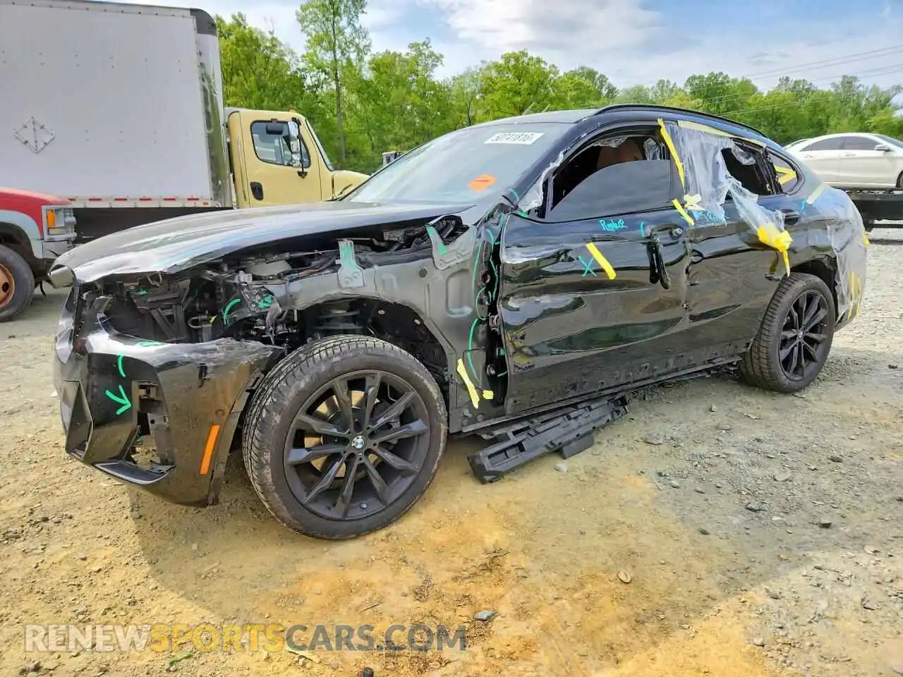 1 Photograph of a damaged car 5UX33DT04R9V11242 BMW X4 2024