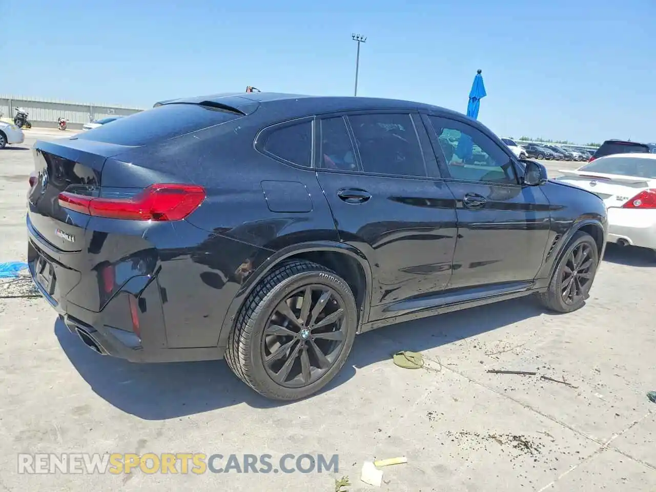 3 Photograph of a damaged car 5UX43DT07R9W30746 BMW X4 2024