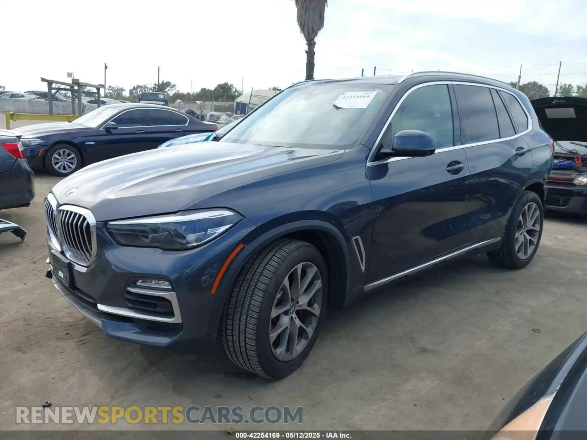 2 fotografías del automóvil dañado 5UXCR4C06M9F26786 BMW X5 2021