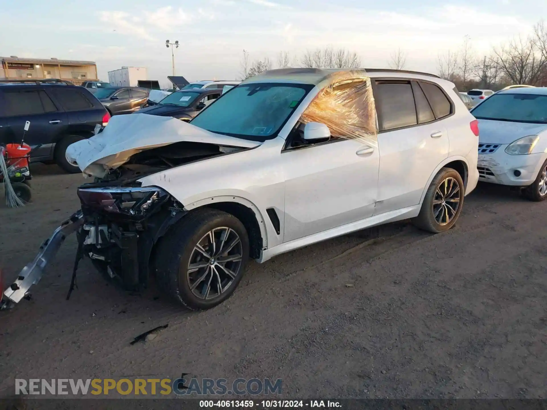 2 fotografías del automóvil dañado 5UXCR6C04M9G30530 BMW X5 2021