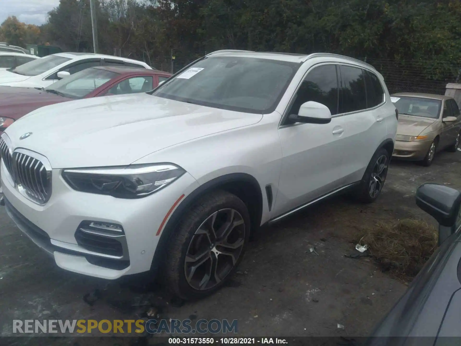 2 fotografías del automóvil dañado 5UXCR6C06M9G47779 BMW X5 2021