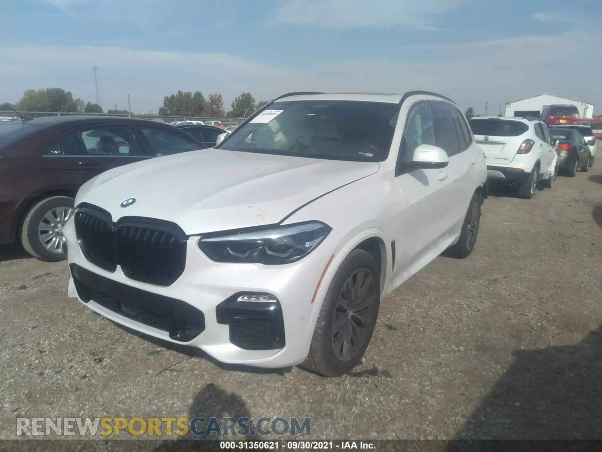 2 Photograph of a damaged car 5UXJU4C05M9E76243 BMW X5 2021