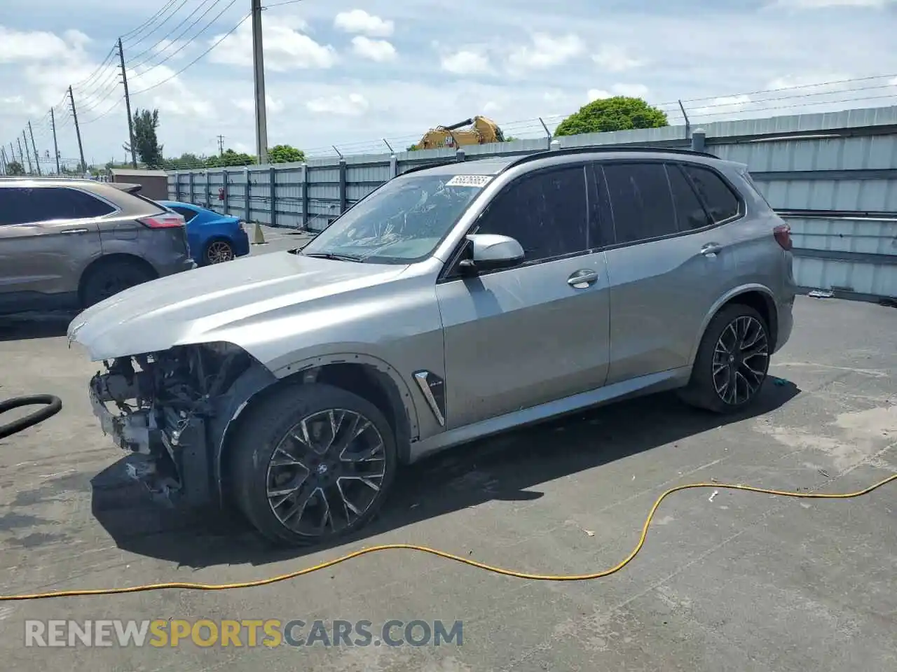 1 Photograph of a damaged car 5YMJU0C02M9D88848 BMW X5 2021