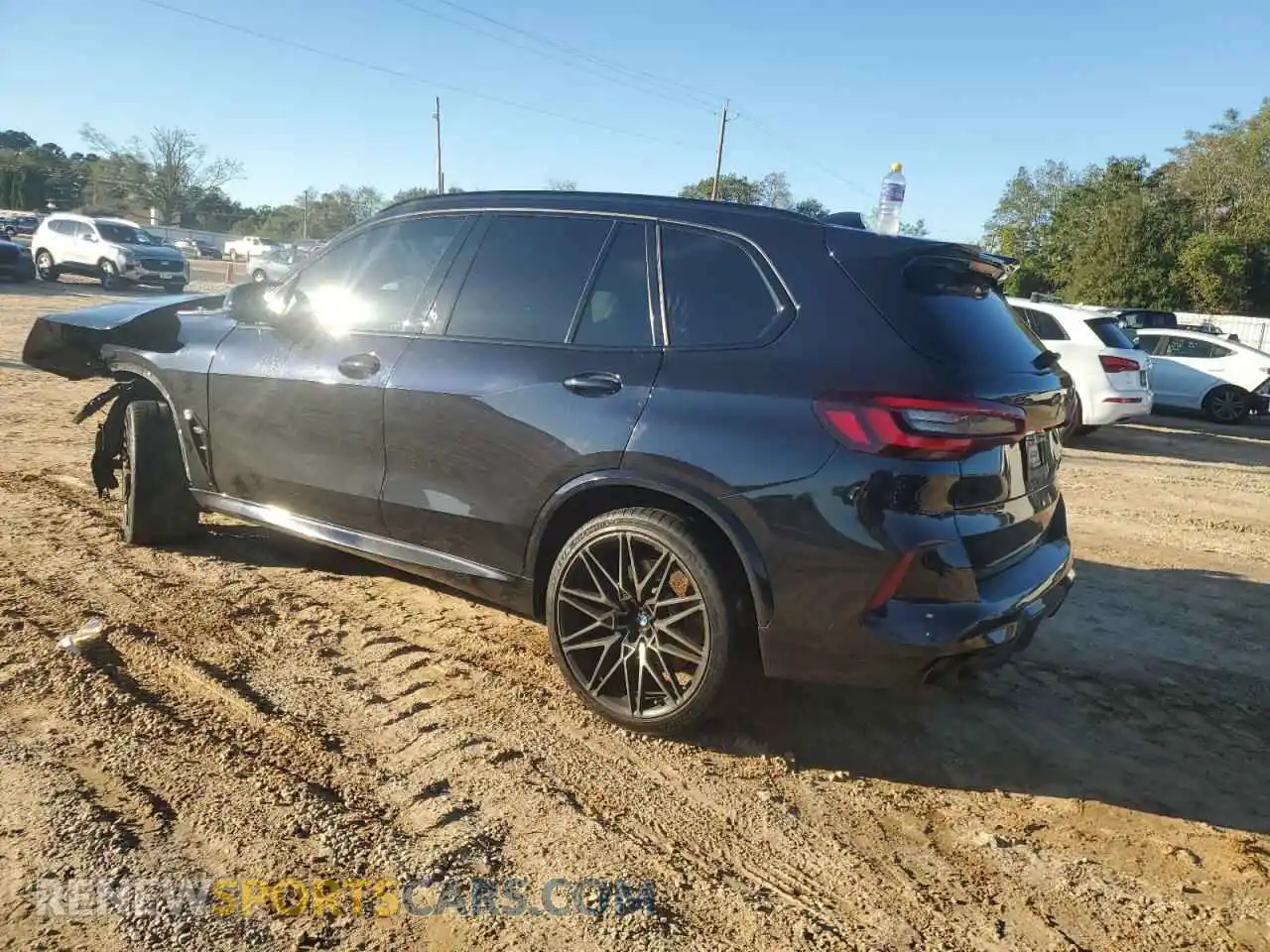 2 fotografías del automóvil dañado 5YMJU0C03M9D99549 BMW X5 2021