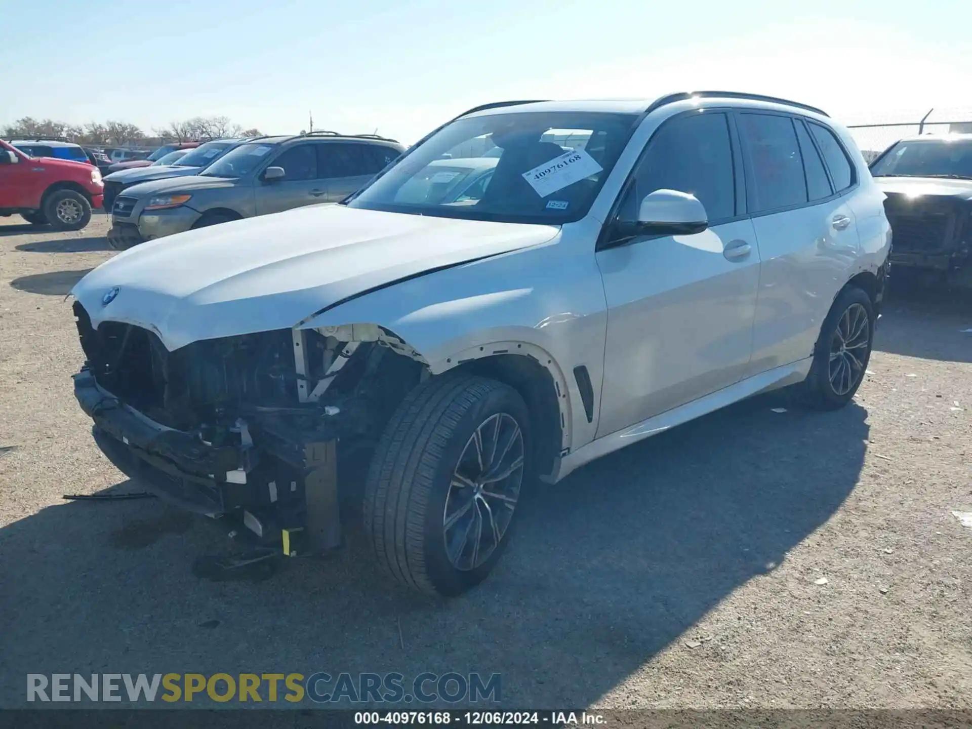 2 fotografías del automóvil dañado 5UXCR6C02N9K89157 BMW X5 2022
