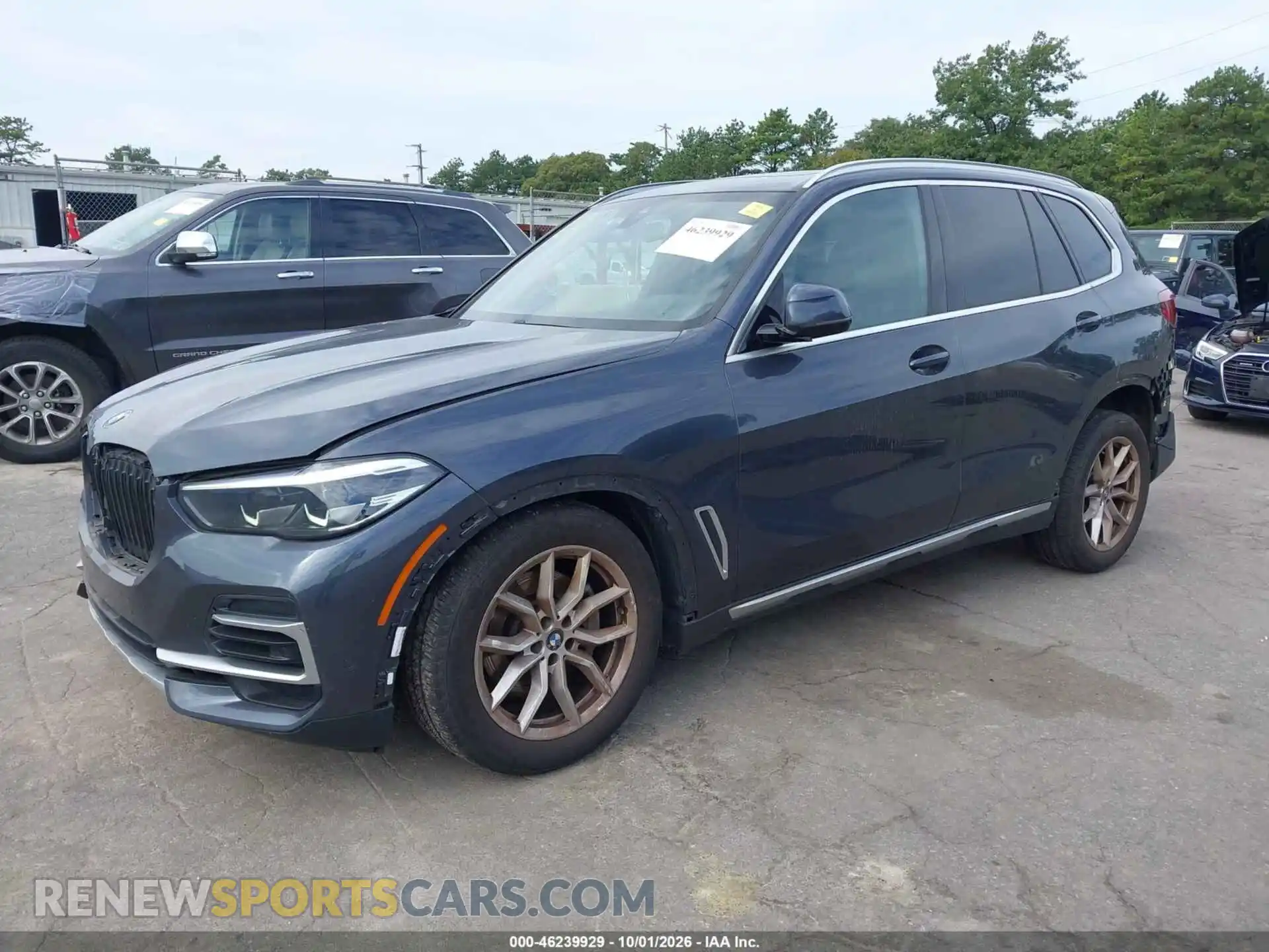 2 fotografías del automóvil dañado 5UXCR6C06N9J27452 BMW X5 2022