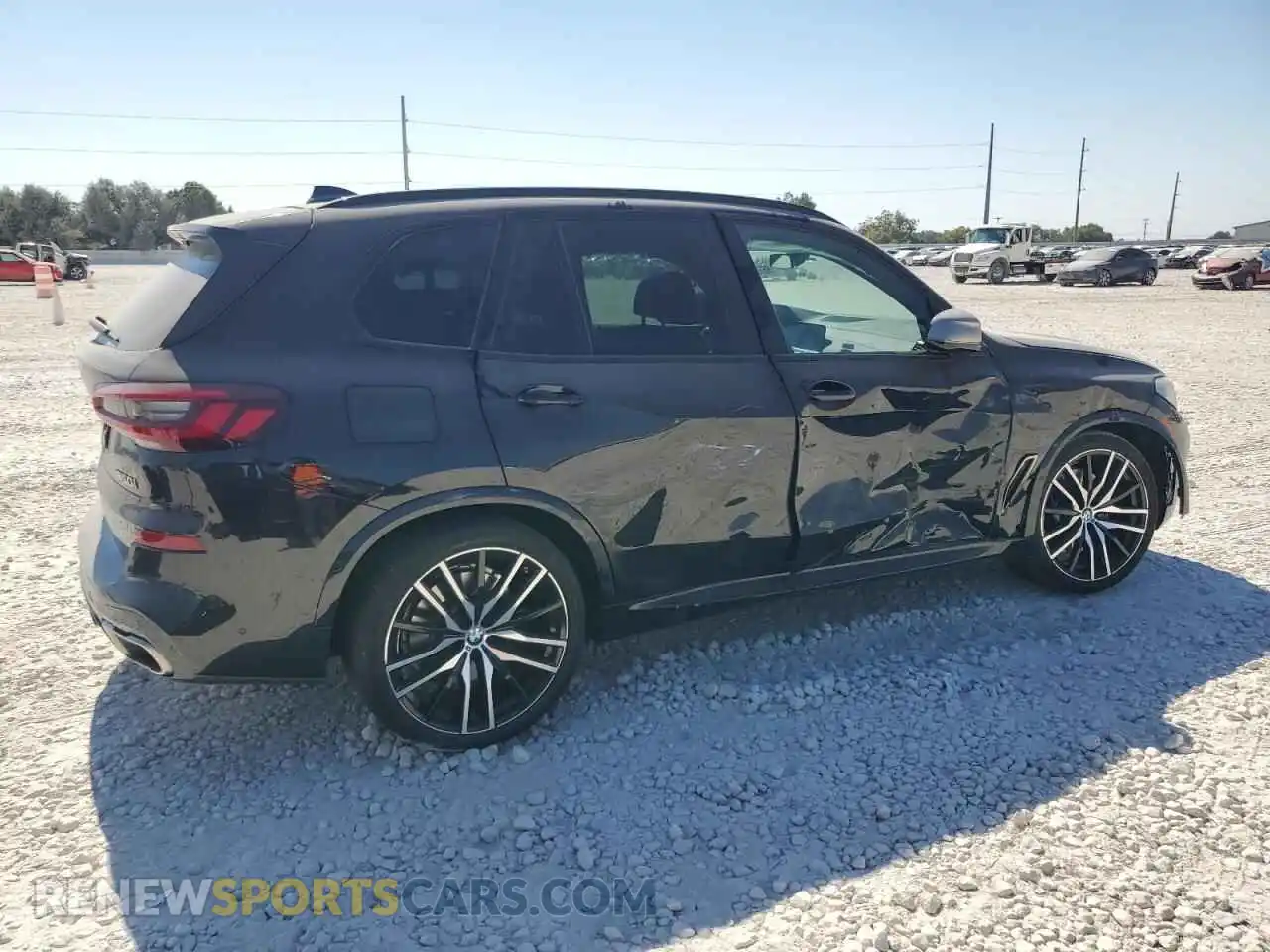 3 Photograph of a damaged car 5UXJU4C01P9N49044 BMW X5 2023