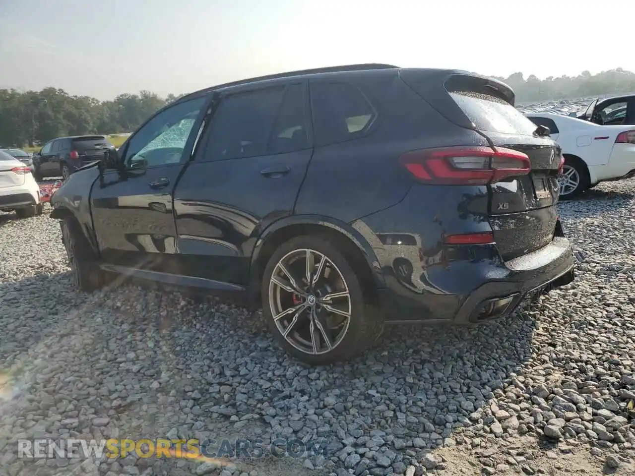 2 fotografías del automóvil dañado 5UXJU4C08P9P89935 BMW X5 2023