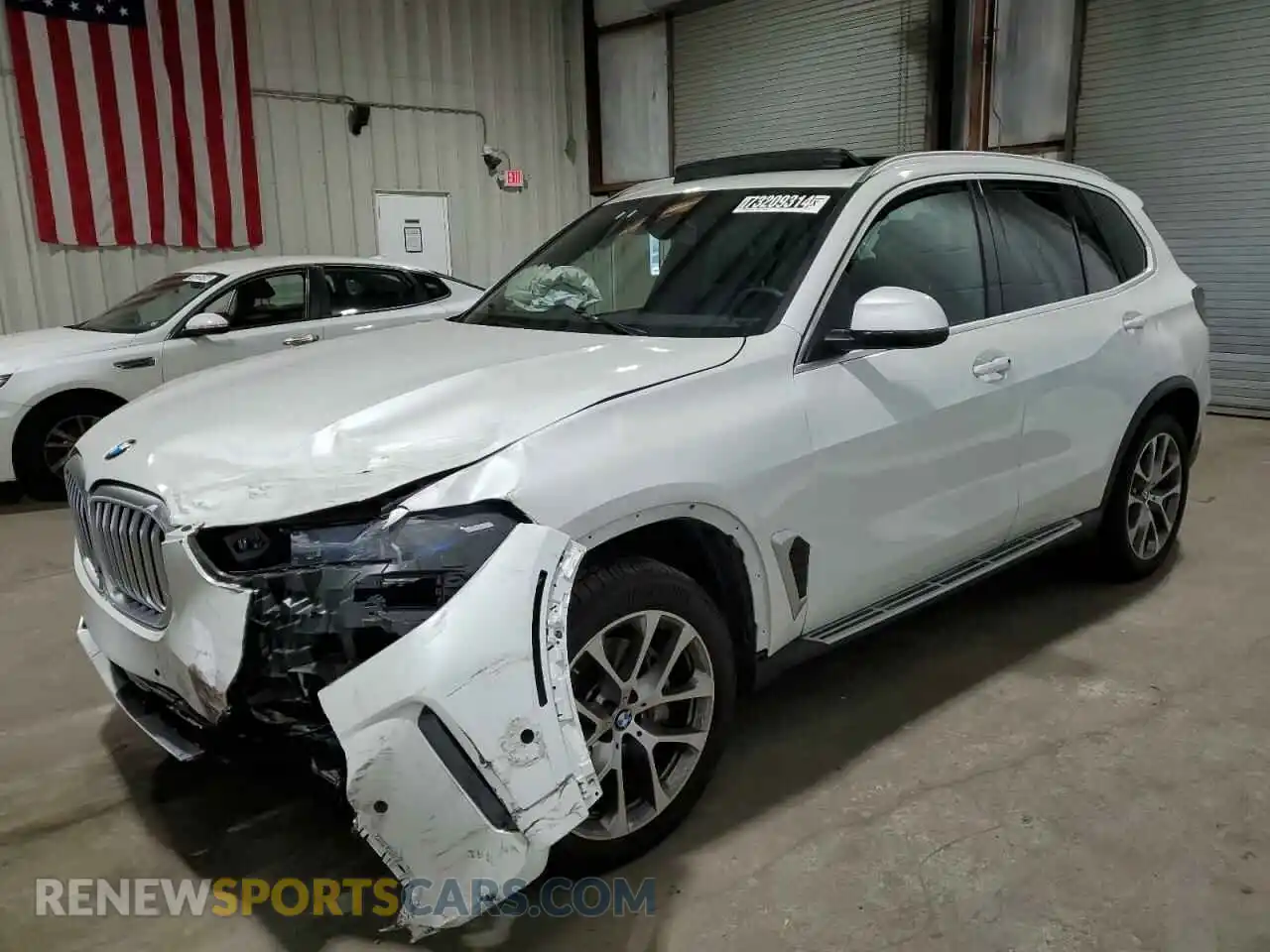 1 Photograph of a damaged car 5UX13EU00R9U83077 BMW X5 2024