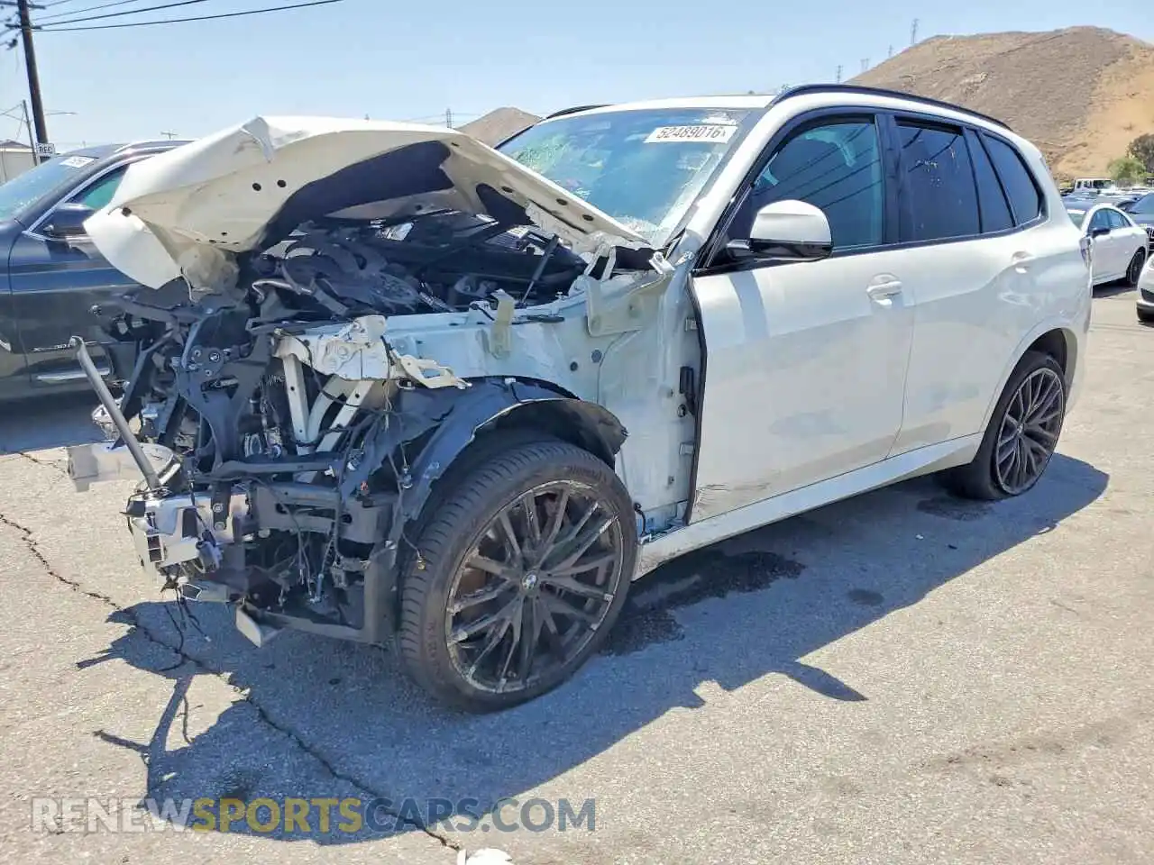 1 Photograph of a damaged car 5UX23EU03R9S86229 BMW X5 2024